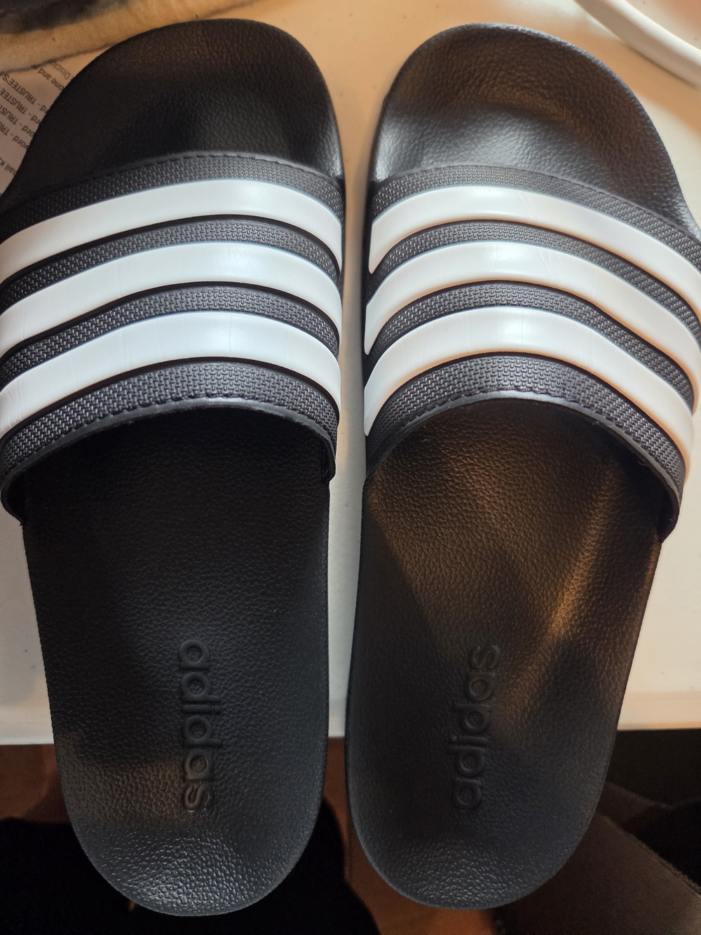 adidas Black Slides with White Three-Stripes